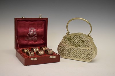 Lot 108 - Indian silver handbag and set of six cased napkin rings