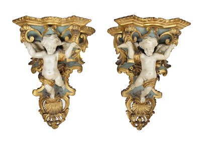 Lot 515 - Pair of rococo cherub wall brackets