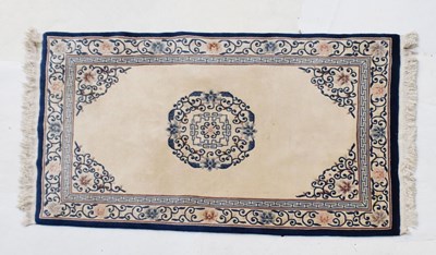 Lot 564 - Two Chinese wool rugs