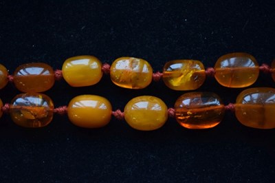 Lot 80 - Graduated row of amber beads