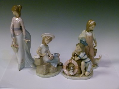 Lot 528 - Lladro - Four boxed porcelain figures