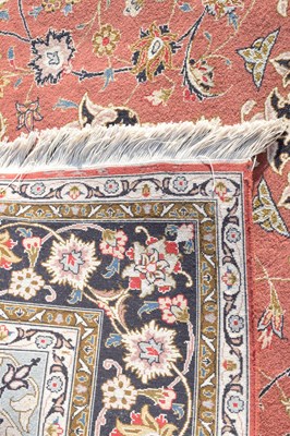 Lot 469 - Persian wool rug, pink ground