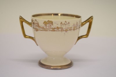 Lot 294 - Alfred Powell (Wedgwood), small creamware twin-handled footed cup