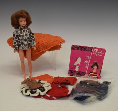 Lot 270 - Vintage Sindy doll, together with a quantity of clothing/outfits and accessories