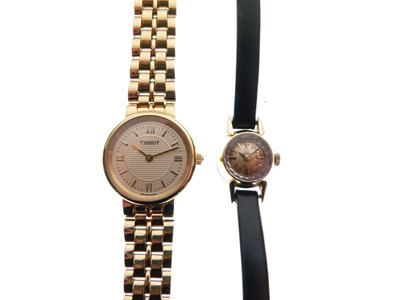 Lot 68 - Omega - Lady's 18K wristwatch together with Tissot gold plated stainless steel watch
