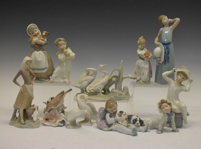 Lot 327 - Lladro - Group of eleven porcelain figures/figure groups and Nao figure