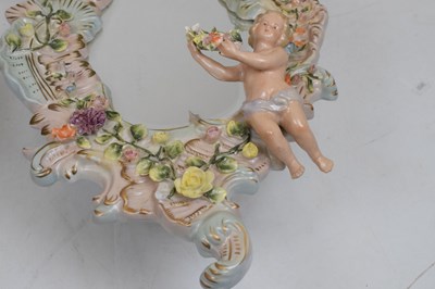Lot 275 - Pair of 20th Century German Sitzendorf porcelain mirrors