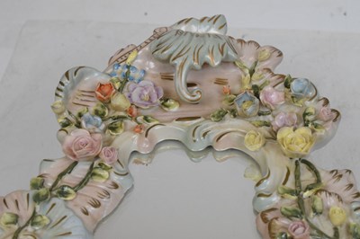 Lot 275 - Pair of 20th Century German Sitzendorf porcelain mirrors