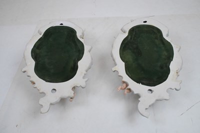 Lot 275 - Pair of 20th Century German Sitzendorf porcelain mirrors