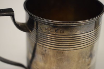 Lot 77 - Two George III silver mugs