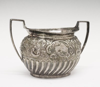 Lot 86 - Late Victorian two handled silver sugar bowl with embossed decoration