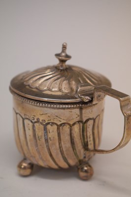 Lot 88 - Late Victorian silver lidded mustard pot and a pair of salts