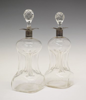 Lot 105 - Pair of silver collared glug-glug decanters
