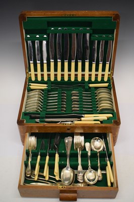 Lot 471 - Art Deco oak-cased eight setting canteen of silver-plated flatware, Hamilton & Inches