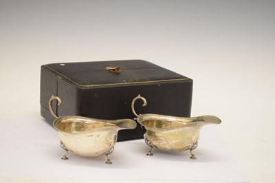 Lot 96 - George V cased pair of silver sauceboats, London 1916