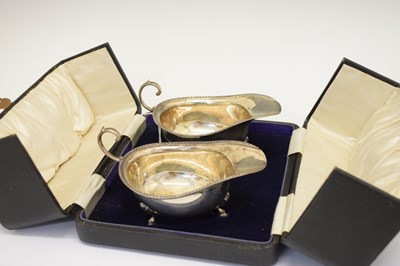 Lot 96 - George V cased pair of silver sauceboats, London 1916