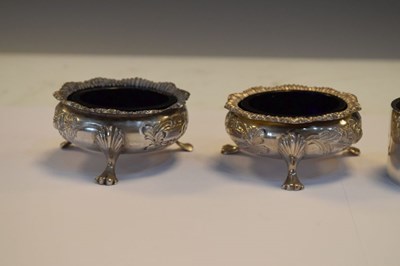 Lot 134 - Set of four Victorian silver salts with blue glass liners