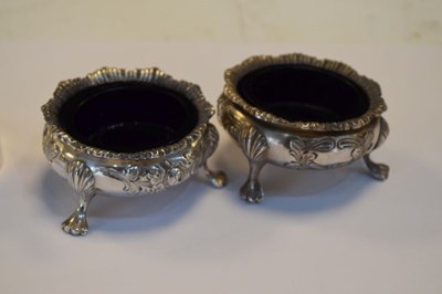 Lot 134 - Set of four Victorian silver salts with blue glass liners
