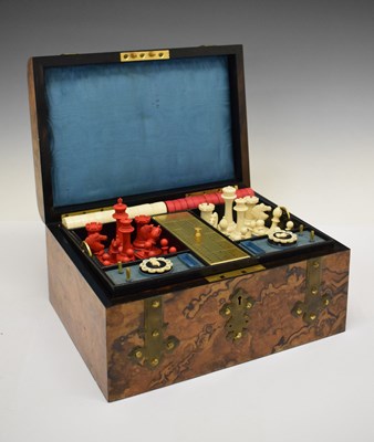 Lot 166 - Victorian brass-bound figured walnut games box