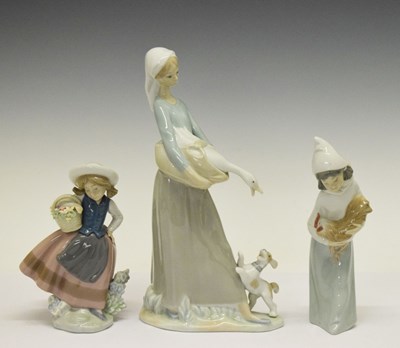 Lot 290 - Two Lladro figures and a Nao figure