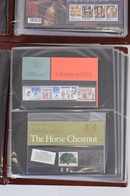 Lot 125 - Collection of GB postage stamp presentation packs in ten Royal Mail albums