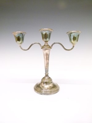 Lot 75 - Elizabeth II silver three-branch candelabra