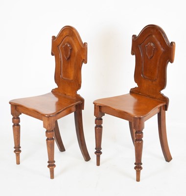 Lot 485 - Pair of mahogany hall chairs