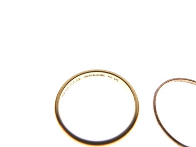 Lot 25 - 22ct wedding band, and a narrower 22ct gold wedding band
