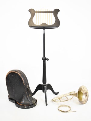 Lot 211 - Boosey and Hawkes French horn and oak lyre-form music stand