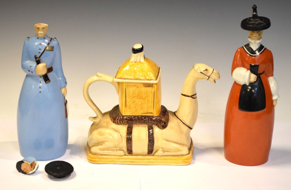Lot 354 - Two Roby, Paris figural decanters and a