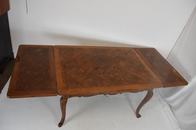 Lot 391 - French oak parquetry draw-leaf table