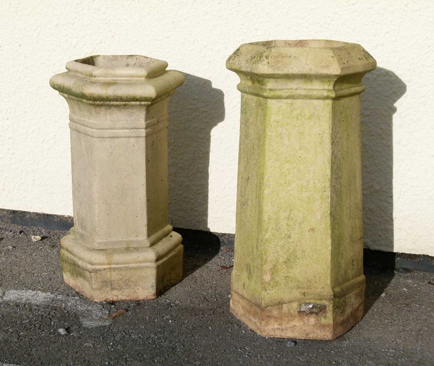 Lot 562 - Two hexagonal composite stone chimney pots