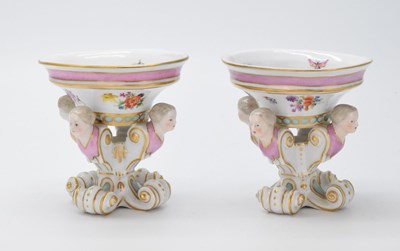 Lot 310 - Pair Meissen oval salts, cruciform mask bases