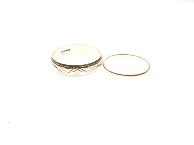 Lot 18 - 18ct gold wedding band, and a 9ct gold wedding band