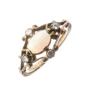 Lot 8 - 9ct gold ring centrally set an oval opal cabochon and four single cut diamonds