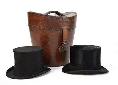 Lot 169 - Leather hatbox with two top hats