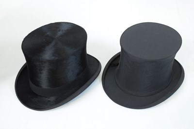 Lot 169 - Leather hatbox with two top hats