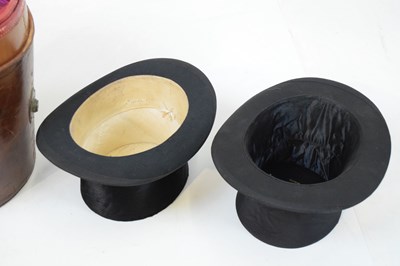 Lot 169 - Leather hatbox with two top hats