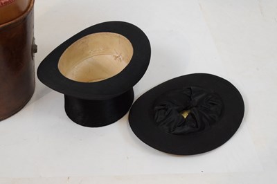 Lot 169 - Leather hatbox with two top hats