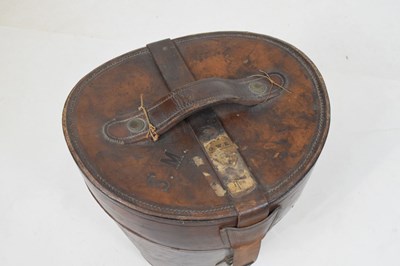 Lot 169 - Leather hatbox with two top hats