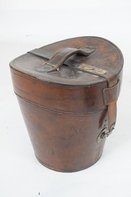 Lot 169 - Leather hatbox with two top hats