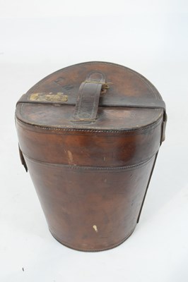 Lot 169 - Leather hatbox with two top hats