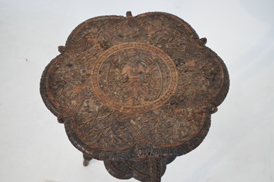 Lot 365 - Carved Indian tripod occasional table