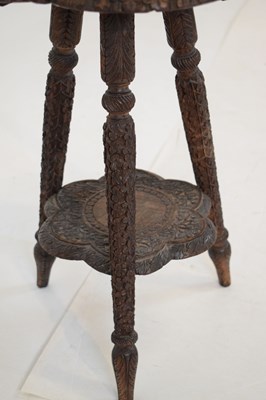 Lot 365 - Carved Indian tripod occasional table