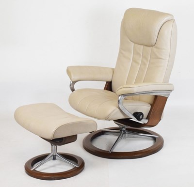 Lot 482 - Stressless beige leather swivel easy chair and matching footstool