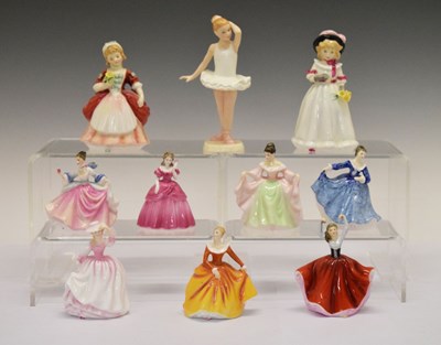 Lot 340 - Nine Royal Doulton figures and a Coalport figure