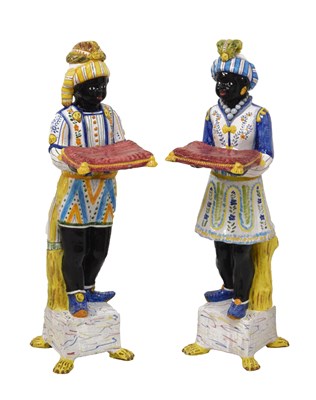 Lot 596 - 20th Century French faience blackamoor figures