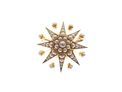 Lot 37 - Seed pearl starburst brooch