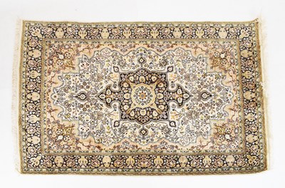 Lot 428 - Middle Eastern silk on wool rug