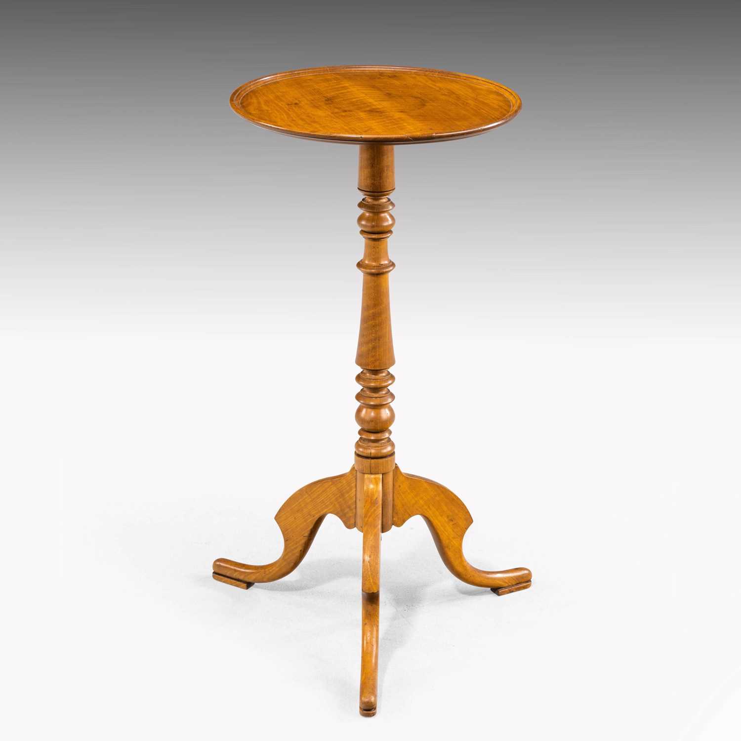 Lot 557 - Satinwood pedestal wine table